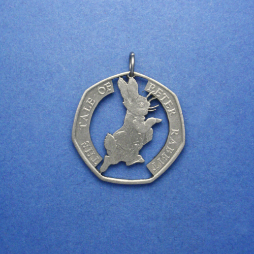 Großbritannien 50 Pence <br> <br> Peter Rabbit <br> <br> Silberfarben <br> <br> ø 27.3 mm <br> <br> Standardausführung 85 €