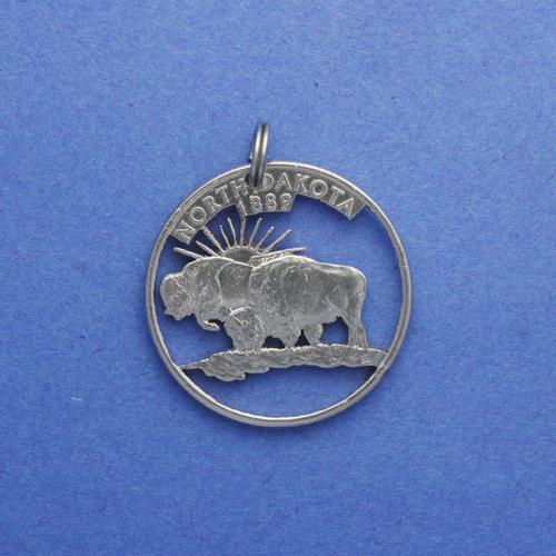 0.25 Dollar <br> <br> Amerikanische Bisons in North Dakota <br> <br> Silberfarben <br> <br> ø 24.2 mm <br> <br> Standardausführung 75 €